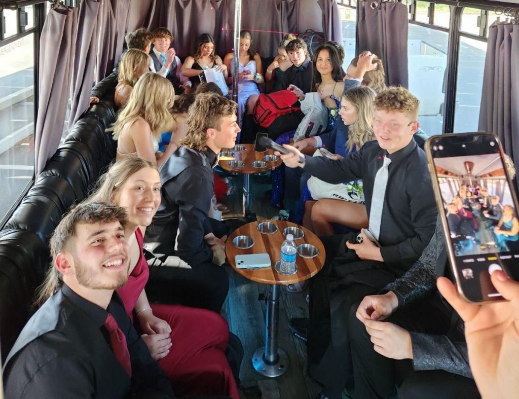 A group of people sitting around a table.