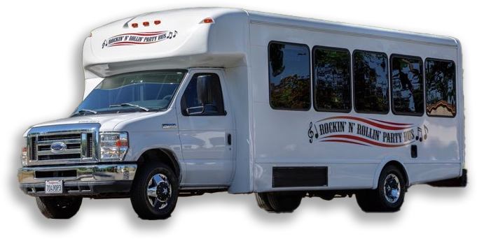 A white bus is parked in the parking lot.